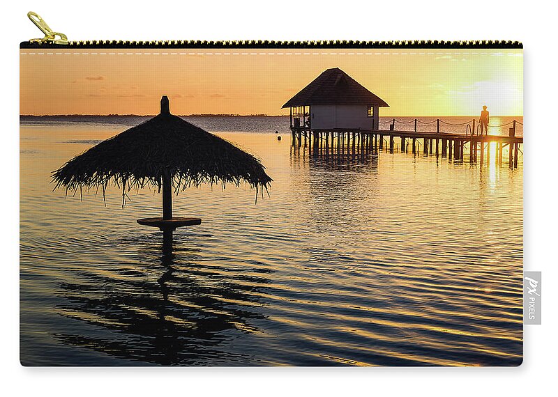 Fakarava Zip Pouch featuring the photograph Fakarava - sunset at the Pearl Havaiki by Olivier Parent