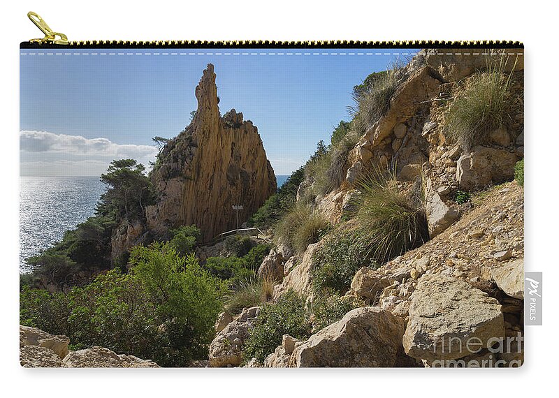 Mediterranean Carry-all Pouch featuring the photograph Falla del Moraig, Rocks and the Mediterranean Sea by Adriana Mueller