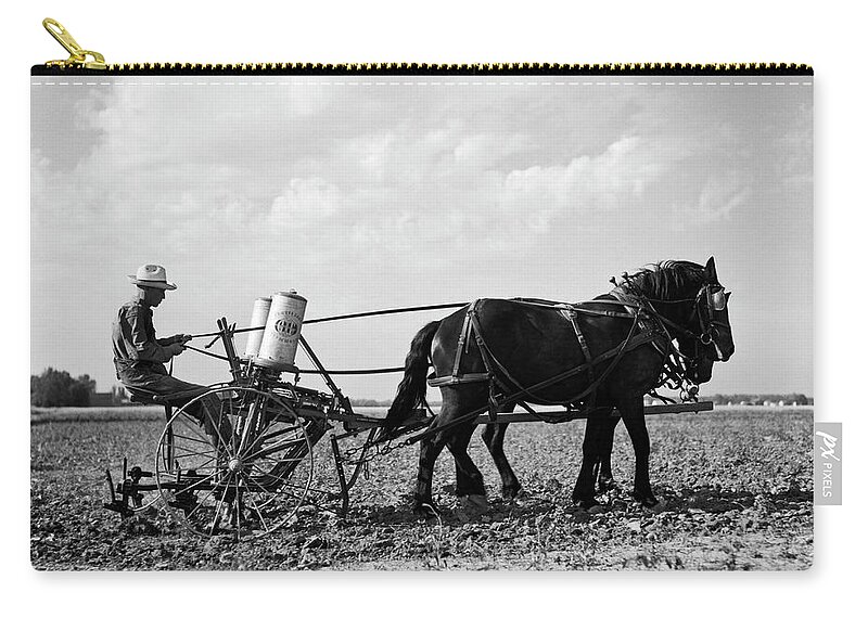 1 Person Zip Pouch featuring the photograph Farmer Fertilizing Corn by Underwood Archives  Arthur Rothstein