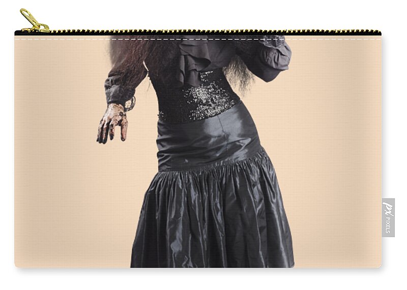 Scare Zip Pouch featuring the photograph Female jester holding lit fire torch by Jorgo Photography