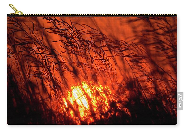 Flora Zip Pouch featuring the photograph Fiery Marsh Sunset by Liza Eckardt
