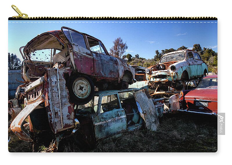 Wrecking Yard Zip Pouch featuring the photograph The Junkyard Kings - Smash Palace. North Island, New Zealand by Earth And Spirit