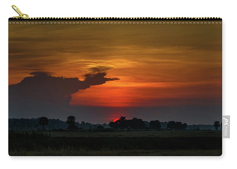 Sunrise Zip Pouch featuring the photograph First Light by Les Greenwood