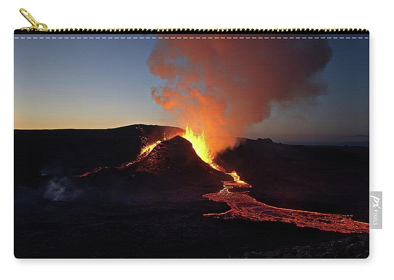 Volcano Zip Pouch featuring the photograph Flowing fire by Christopher Mathews
