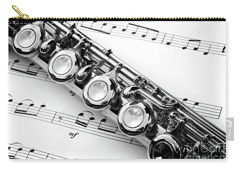 Flute Zip Pouch featuring the photograph Flute and sheet music by Delphimages Photo Creations