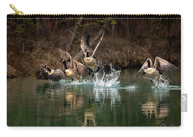 Canada Zip Pouch featuring the photograph Fly Away Home by Gary Johnson