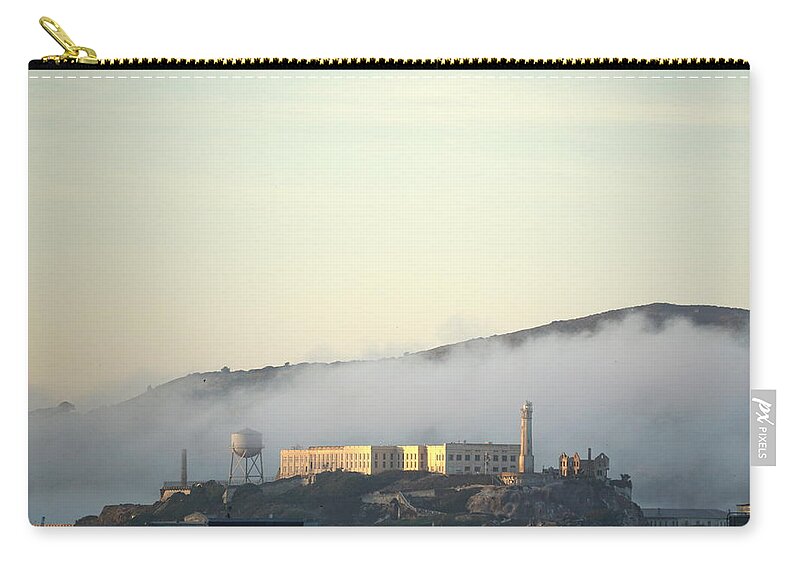 Alcatraz Zip Pouch featuring the photograph Fog Over Alcatraz by Brent Knippel