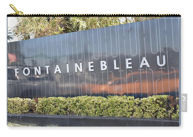 Fontainebleau Zip Pouch featuring the photograph Fontainebleau Hotel #1 by Dick Sauer