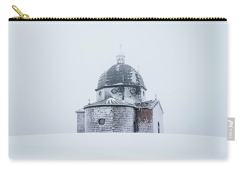 Radhost Carry-all Pouch featuring the photograph Frozen historical chapel - White colour by Vaclav Sonnek