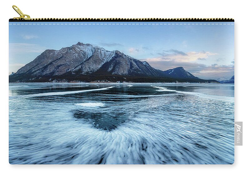 Abraham Zip Pouch featuring the photograph Frozen Snow Pattern by Alex Mironyuk