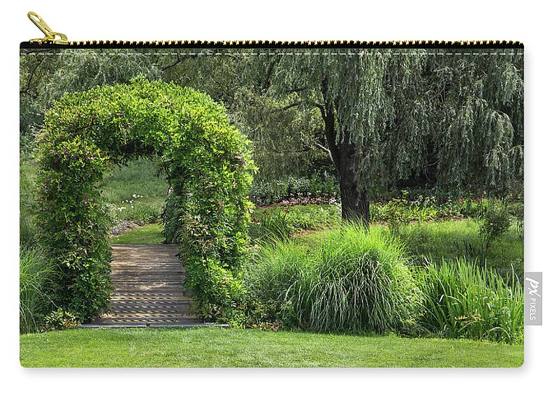 Nature Zip Pouch featuring the photograph Garden trellis over foot bridge. by Phil Cardamone