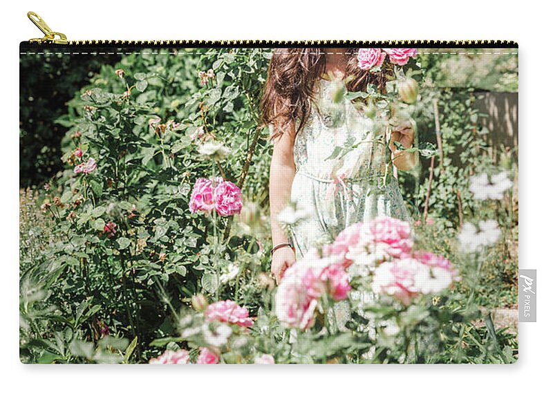 8 Years Old Zip Pouch featuring the photograph Girl with roses by Benoit Bruchez