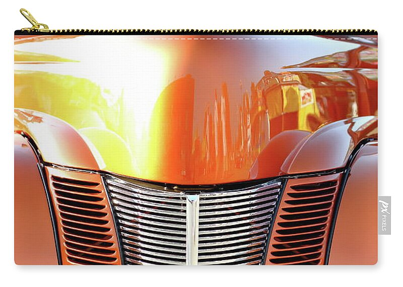 Car Zip Pouch featuring the photograph Glowing by Lens Art Photography By Larry Trager
