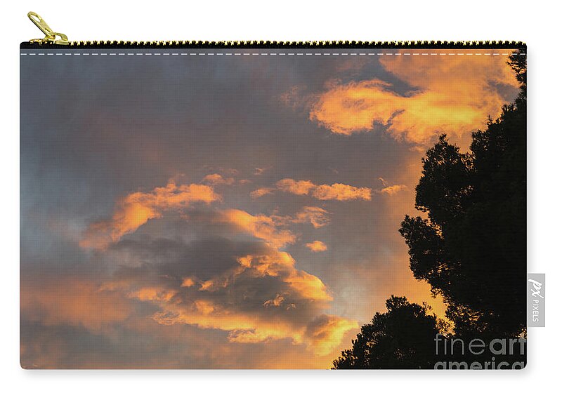 Clouds Carry-all Pouch featuring the photograph Glowing sky by Adriana Mueller