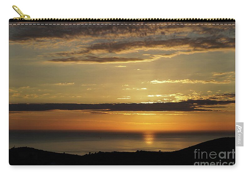 Clouds Zip Pouch featuring the photograph Golden sunrise over the sea by Adriana Mueller