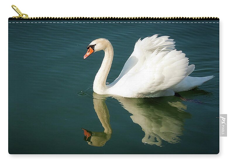 Swan Zip Pouch featuring the photograph Graceful white swan floating by Tatiana Travelways