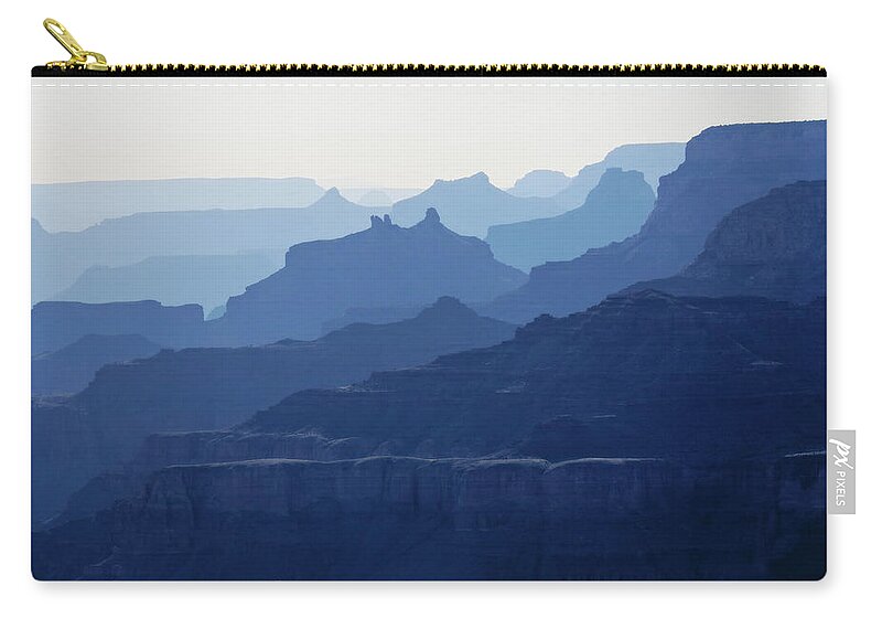 Grand Canyon Carry-all Pouch featuring the photograph Grand Canyon blue silhouettes by Tatiana Travelways