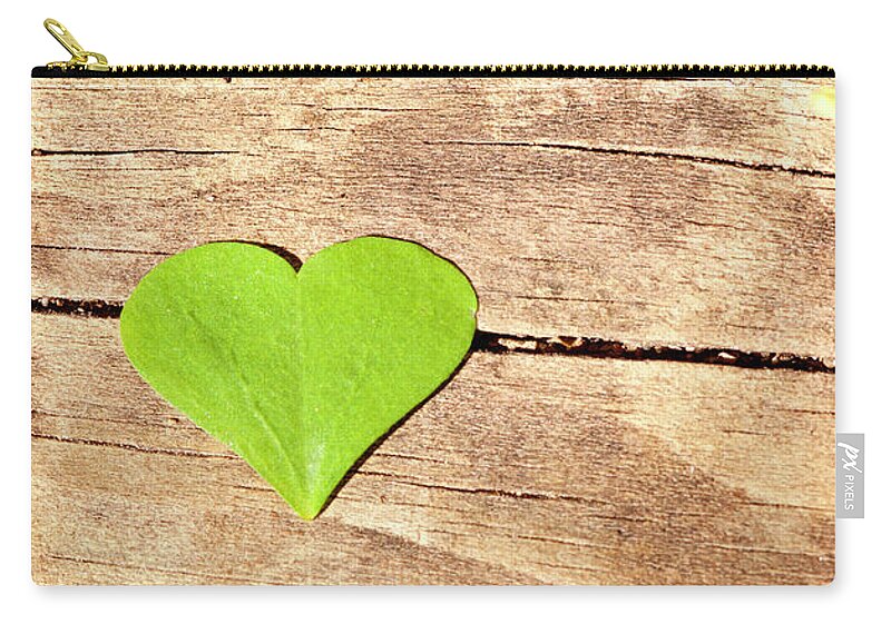 Nature Zip Pouch featuring the photograph Green Heart by Jill Love