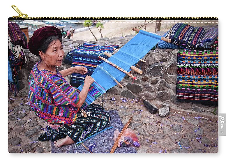 Panajachel Zip Pouch featuring the photograph Guatemalan weaver by Tatiana Travelways