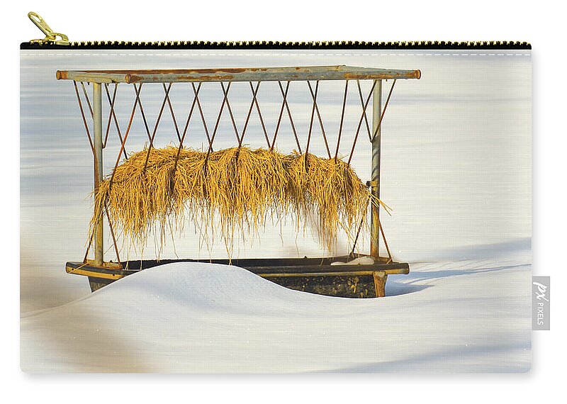 Snow Zip Pouch featuring the photograph Hay Feeder in Snow by Tana Reiff