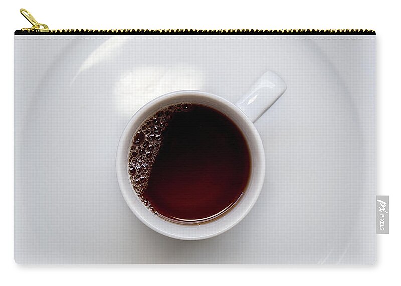 Tea Zip Pouch featuring the photograph Healthy black tea on a cup by Michalakis Ppalis