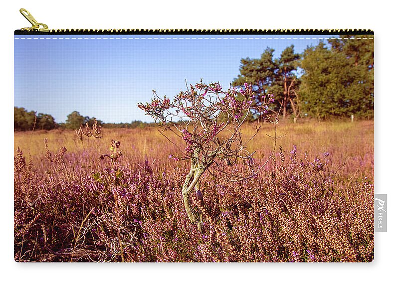 Red Zip Pouch featuring the photograph Heather plant tree by MPhotographer