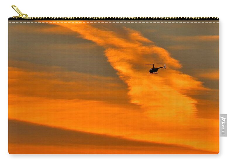 Helicopter Carry-all Pouch featuring the photograph Helicopter Approaching at Sunset by Linda Stern