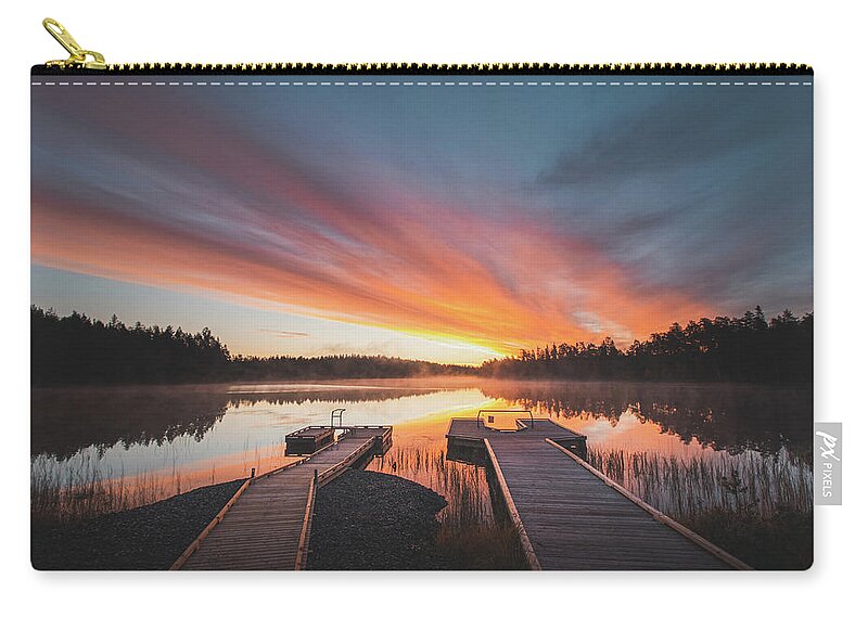 Lake Jatkonjärvi Carry-all Pouch featuring the photograph Hell on a Finnish lake by Vaclav Sonnek