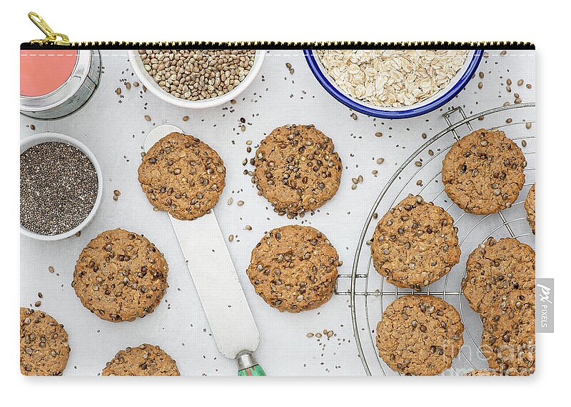 Biscuit Zip Pouch featuring the photograph Hemp and Chia Seed Cookies by Tim Gainey