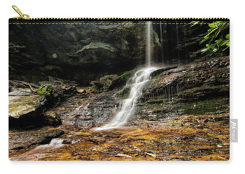 Hidden Falls Zip Pouch featuring the photograph Hidden Falls in Hanging Rock State Park Dansbury North Carolina by Bob Decker