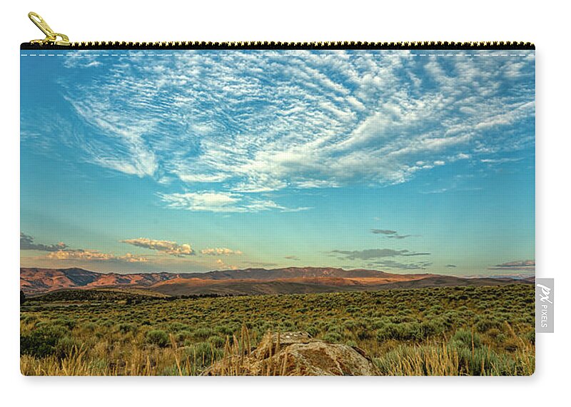 Sunset Zip Pouch featuring the photograph High Desert Cirrus Lightshow by Ron Long Ltd Photography