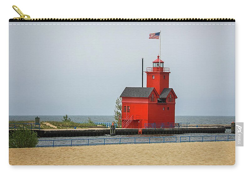 Holland Harbor Light Zip Pouch featuring the photograph Holland Harbor Light by Dan Sproul
