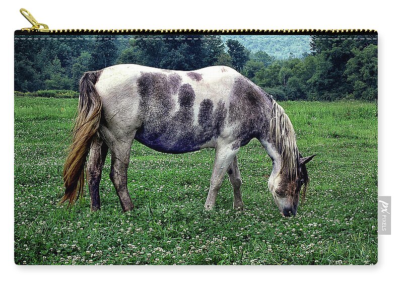 Horse Zip Pouch featuring the photograph Horse Grazing in a Field of Clover by Phil Cardamone