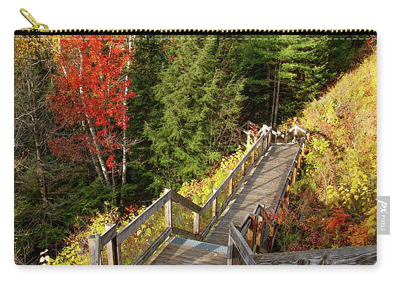 Au Sable River Carry-all Pouch featuring the photograph Huron Manistee National Forest in Michigan with fall colors by Eldon McGraw