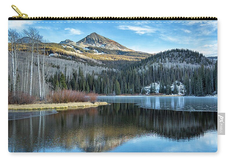 Frozen Zip Pouch featuring the photograph Icy Beginnings by Denise Bush
