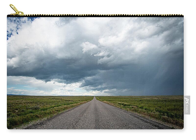 Storm Carry-all Pouch featuring the photograph Idaho Stormy Road by Wesley Aston
