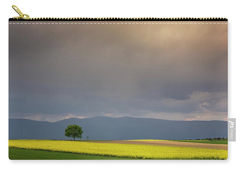 Rapeseed Zip Pouch featuring the photograph In the light of spring by Dominique Dubied