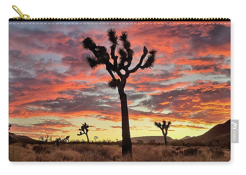 Sunset Zip Pouch featuring the photograph Joshua Tree in Yucca Valley by Chris Casas
