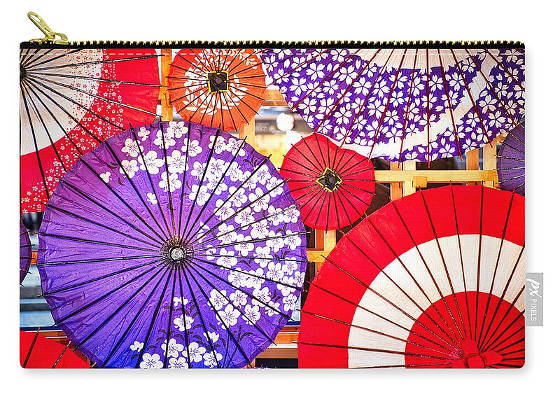 Kyoto Zip Pouch featuring the photograph Kyoto Parasol Display - Japan by Stuart Litoff