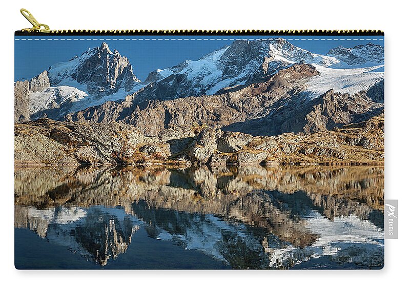Lake Carry-all Pouch featuring the photograph La Meije peak mirrored in Lake Lerie by Olivier Parent