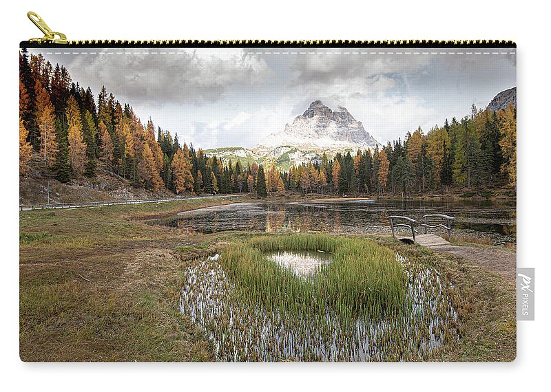 Lago Di Antorno Carry-all Pouch featuring the photograph Lago di antorno lake and Tre cime di lavadero mountain reflection in autumn. Forest landscape South tyrol Italy by Michalakis Ppalis