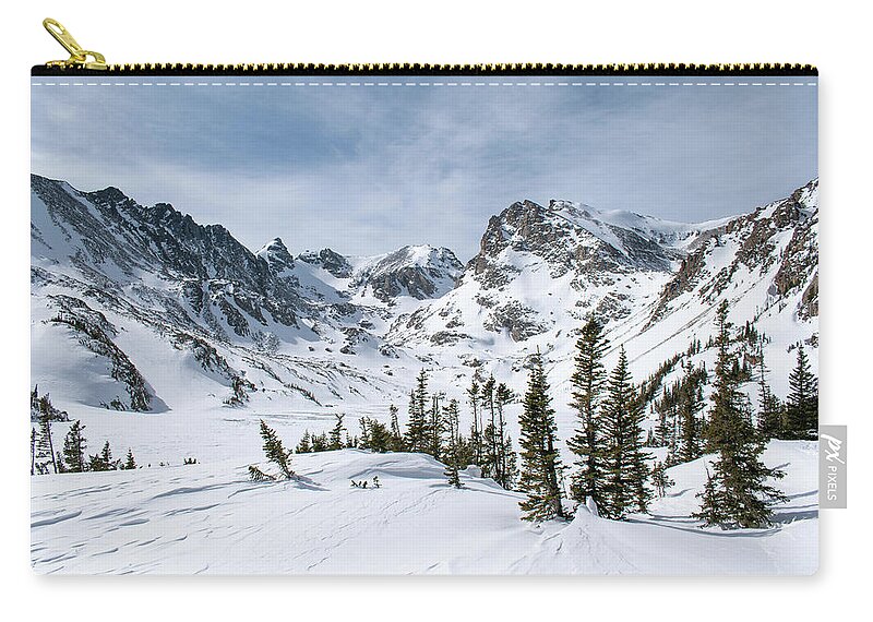 Colorado Zip Pouch featuring the photograph Lake Isabelle Winter by Aaron Spong