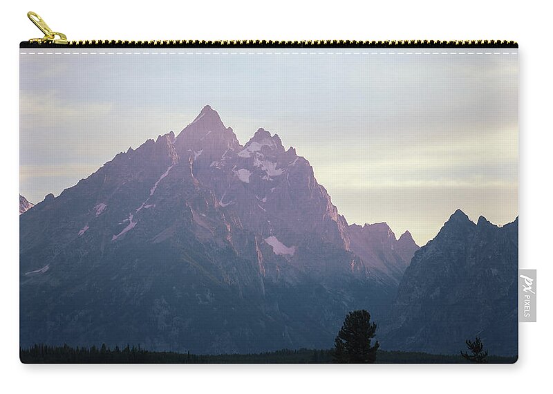 Mountain Zip Pouch featuring the photograph Last bit of Teton light by Go and Flow Photos