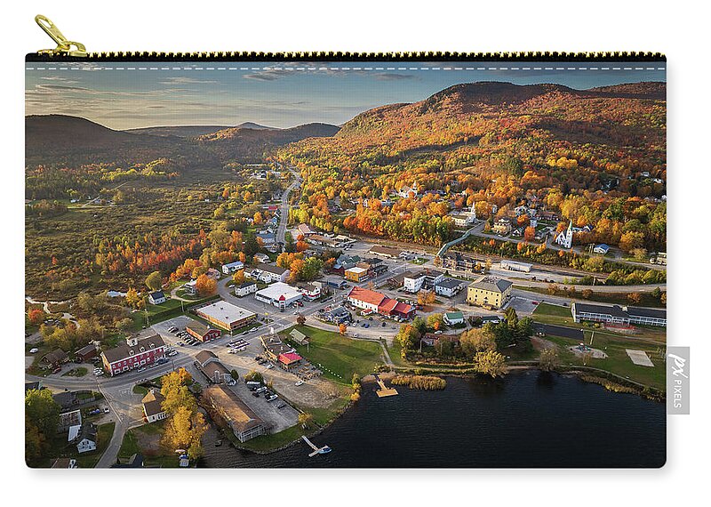 Zip Pouch featuring the photograph Late Day Sunlight Shines On Island Pond, Vermont by John Rowe