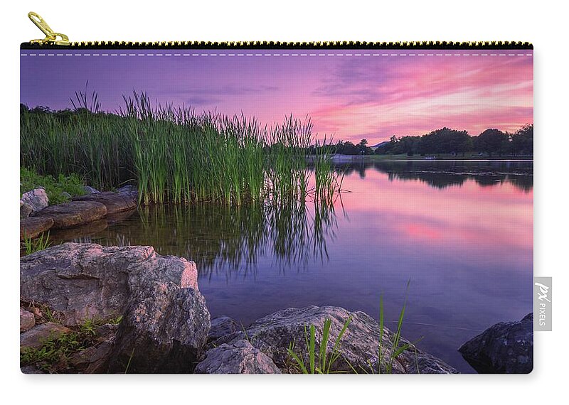 Leaser Zip Pouch featuring the photograph Leaser Lake Shoreside Reed Sunset by Jason Fink