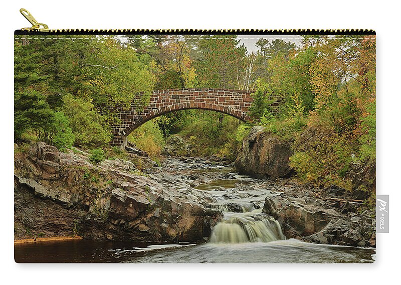 Water Zip Pouch featuring the photograph Lester river bridge by Paul Freidlund