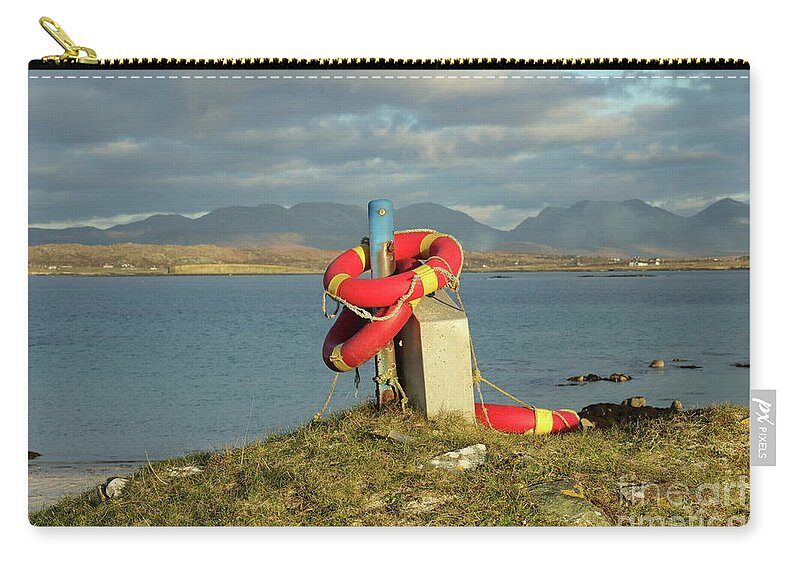 Lifebuoy Connemara Ballyconneely Galway Ireland Saftey Outdoors Ocean Mountains Beach Walking Photography Zip Pouch featuring the photograph Life savers by Peter Skelton