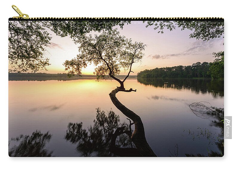 Conroe Zip Pouch featuring the photograph Light the Way by Michael Scott