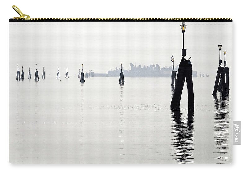 Venice Zip Pouch featuring the photograph Lights on the Venetian lagoon by Eyes Of CC