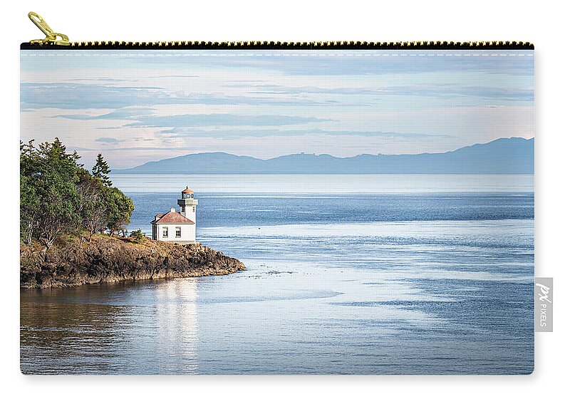 Lime Kiln Lighthouse Zip Pouch featuring the photograph Lime Kiln Lighthouse And The Olympic Mountains by Jordan Hill